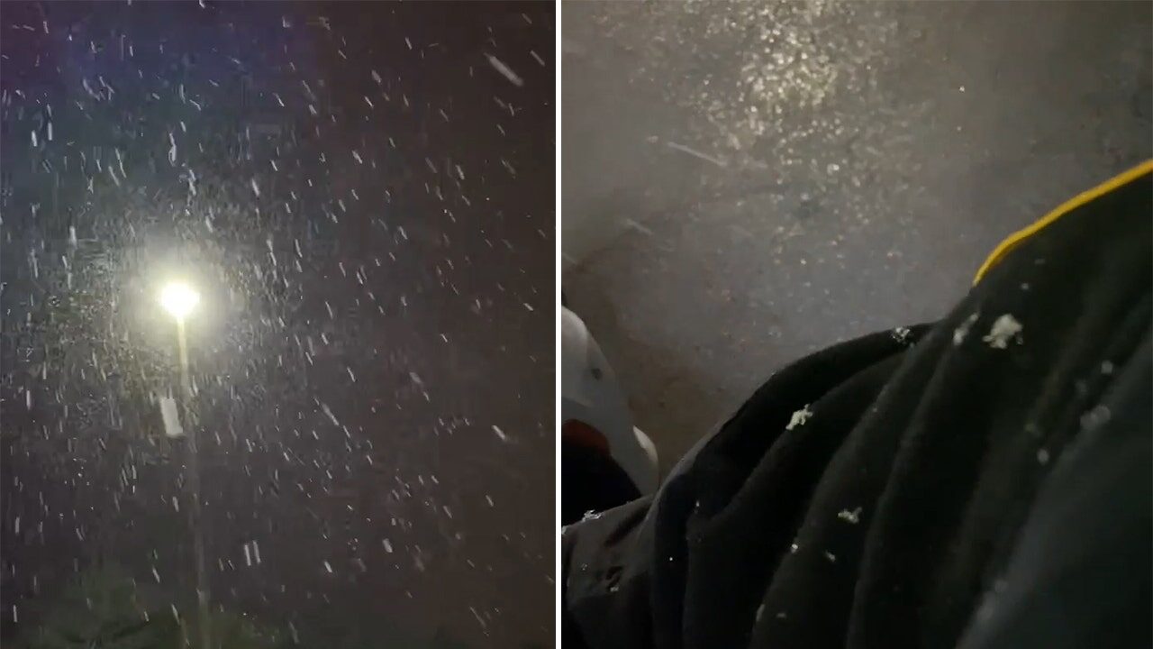 Click to enlarge Snow falls in Florida following first winter storm of 2022