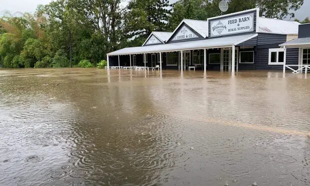 Flood waters seen at the Woolooga Trader in Gympie, Queensland. Flooding north of Brisbane has closed highways and cut off some towns.