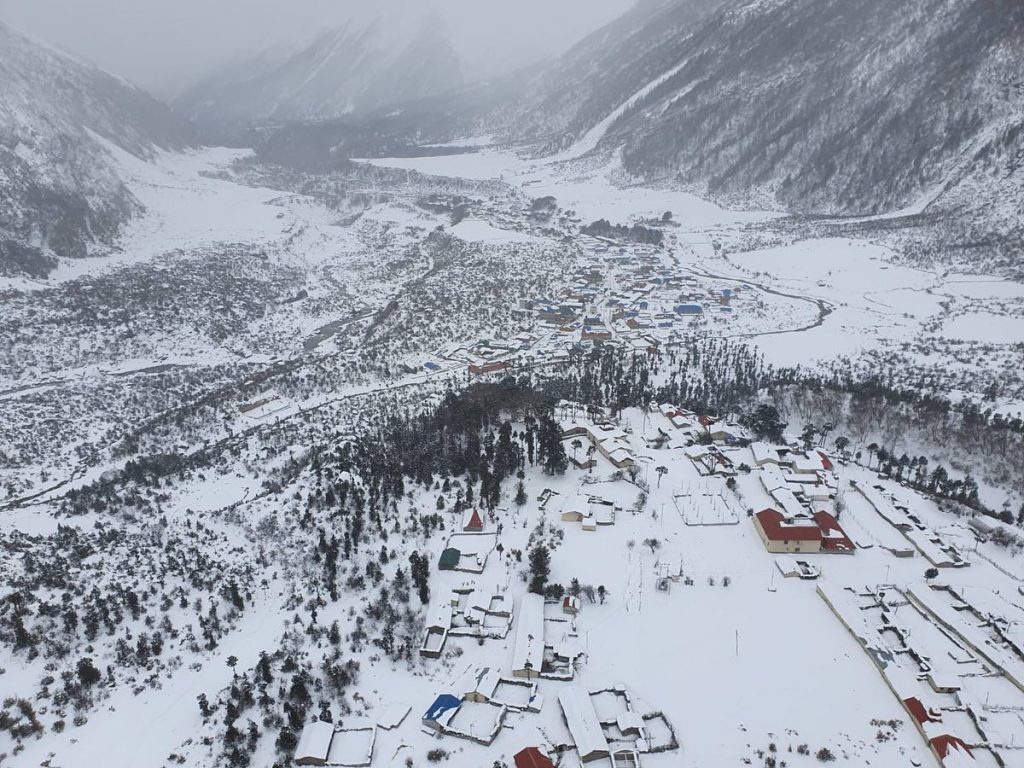 Click to enlarge Samagaon from the air on Friday.