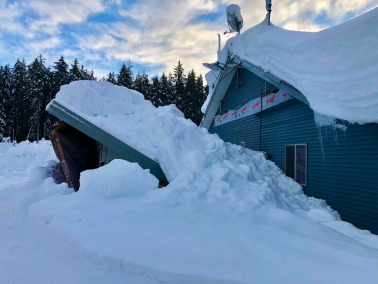 Click to enlarge A collapsed car port at the Public Safety Building in Yakutat.
