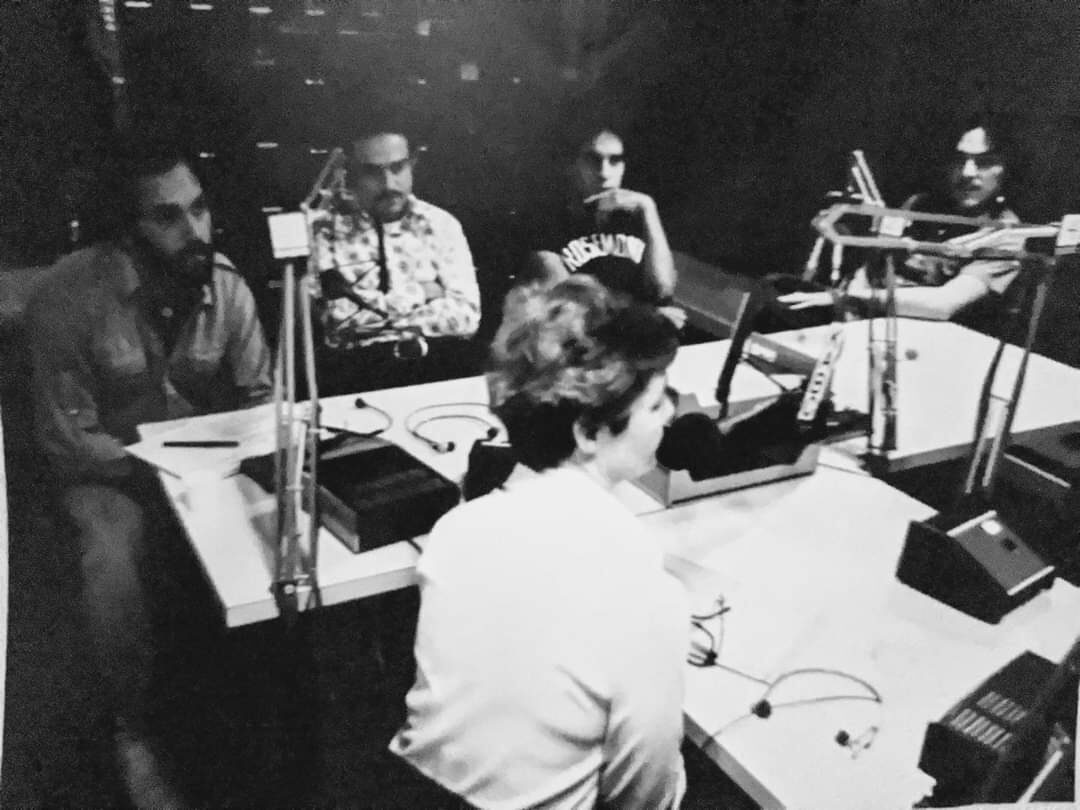 Casey on the far left with the beard, interviewing a witness.