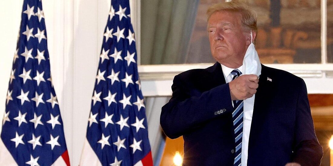 Donald Trump removing the mask
