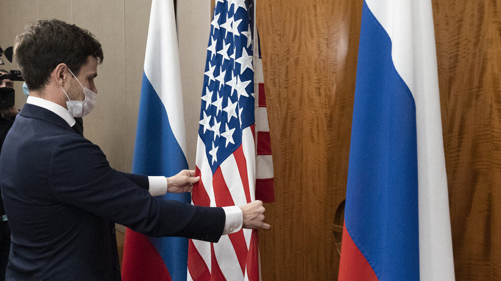 Click to enlarge Russia US talks geneva blinken lavrov flags