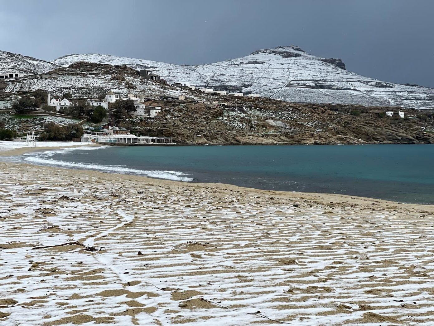 Click to enlarge The famous beaches of Mykonos are covered in snow.