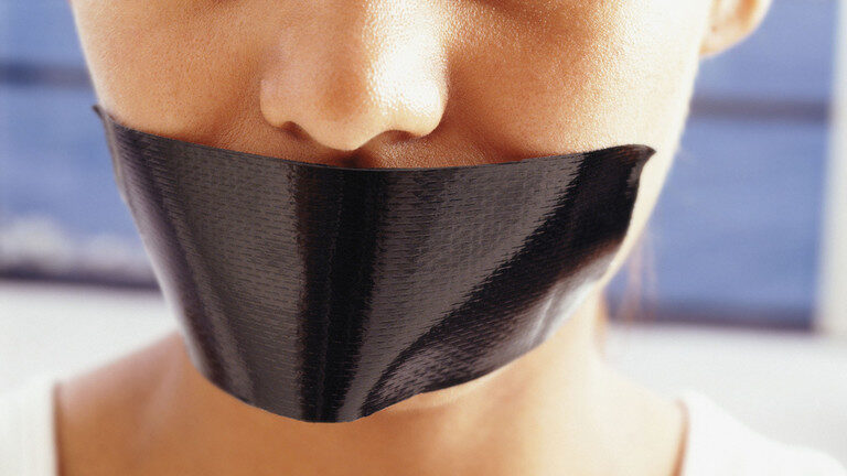 Click to enlarge gagged tape on mouth woke language police