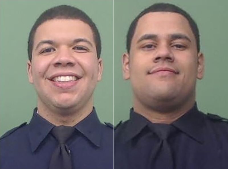 Click to enlarge Jason Rivera Wilbert Mora nypd shot