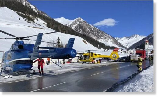 Rescue helicopters stand on a street near the Gammerspitze summit in Tirol after an avalanche killed a 58-year-old local man.