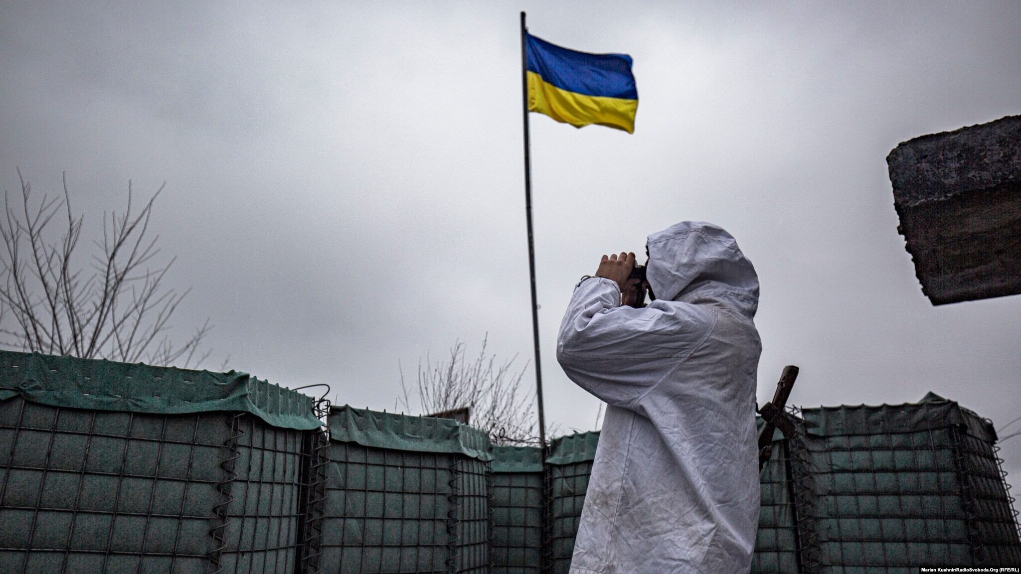 Border guards patrol at a fortified post west of Blahovishchenka