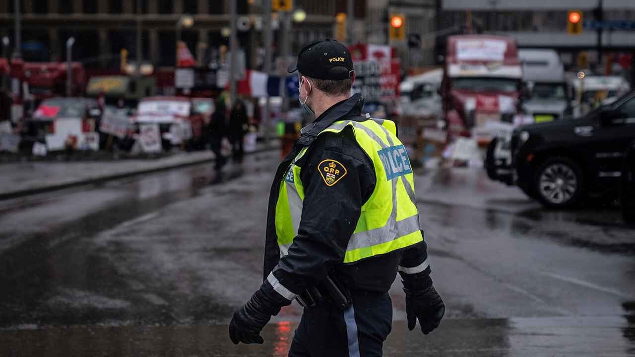 police officer freedom convoy protest