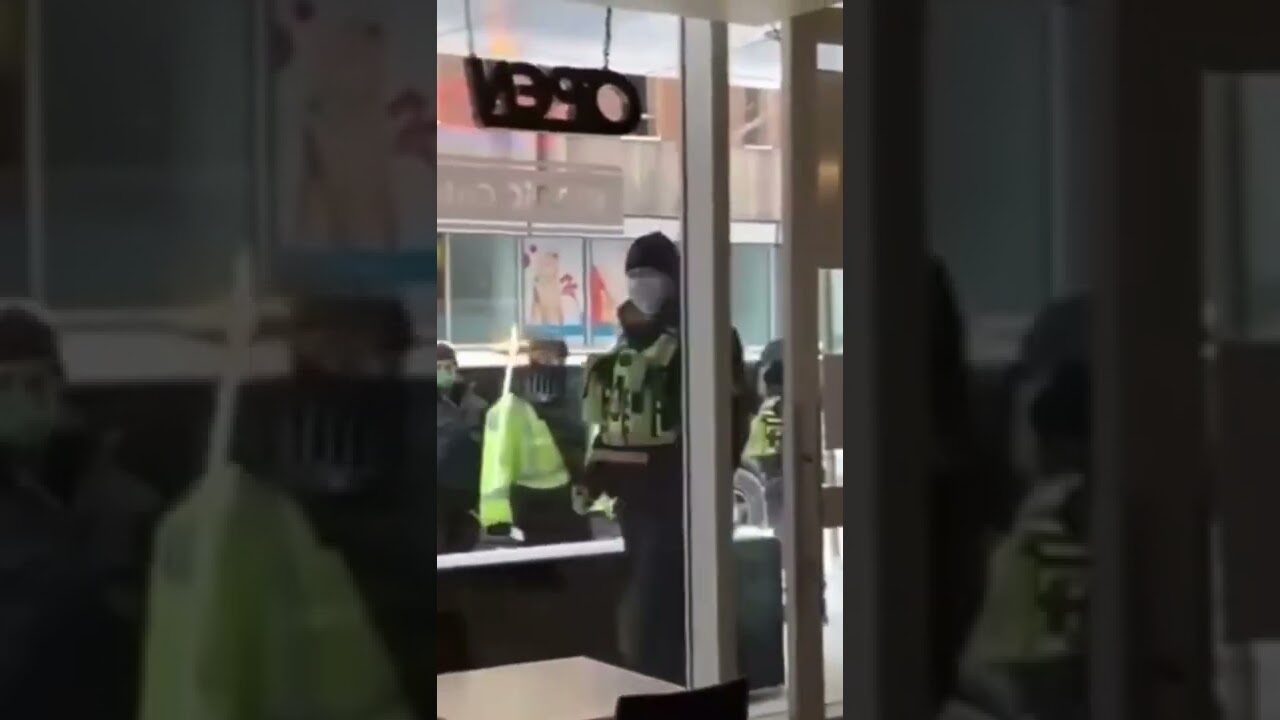 Click to enlarge trudeau police iconic cafe