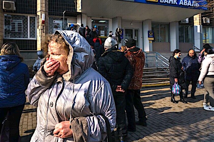 Click to enlarge Woman and ATM