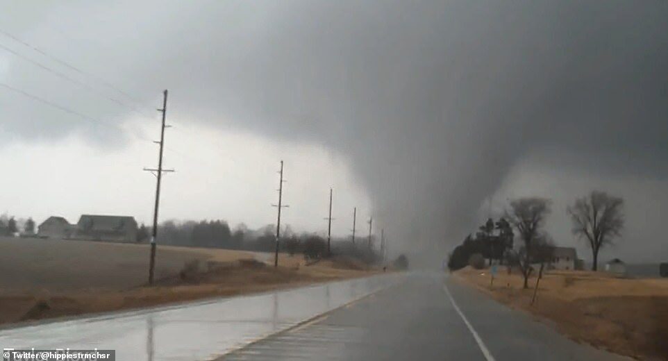 Several twisters ripped through Iowa from 4.30 to 7.30pm, taking down powerlines in its wake