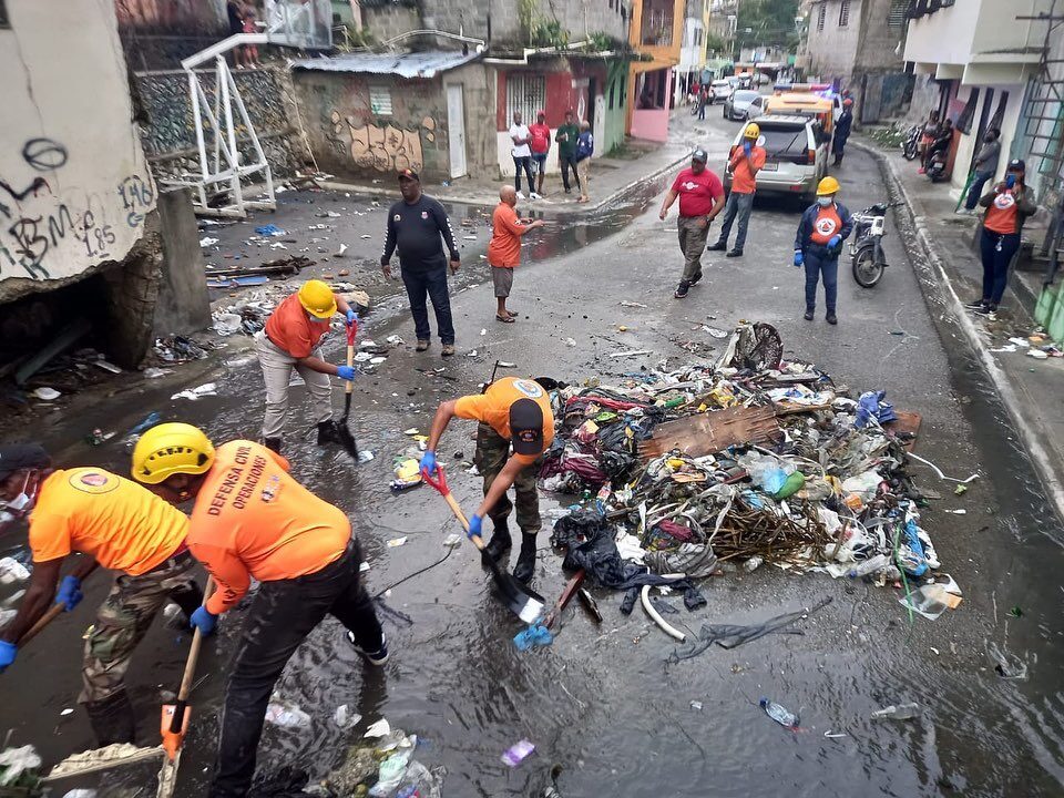 Cleaning up after flood damage in Santo Domingo Oeste, Dominican Republic March 2022.