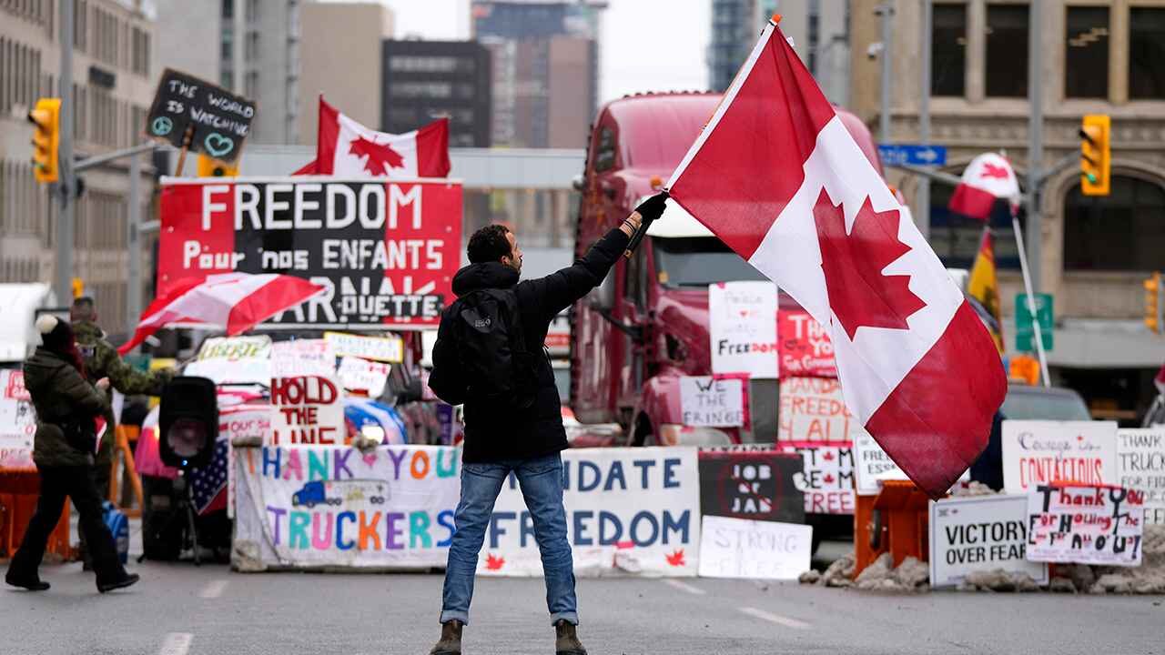 freedom convoy protester canadian flag