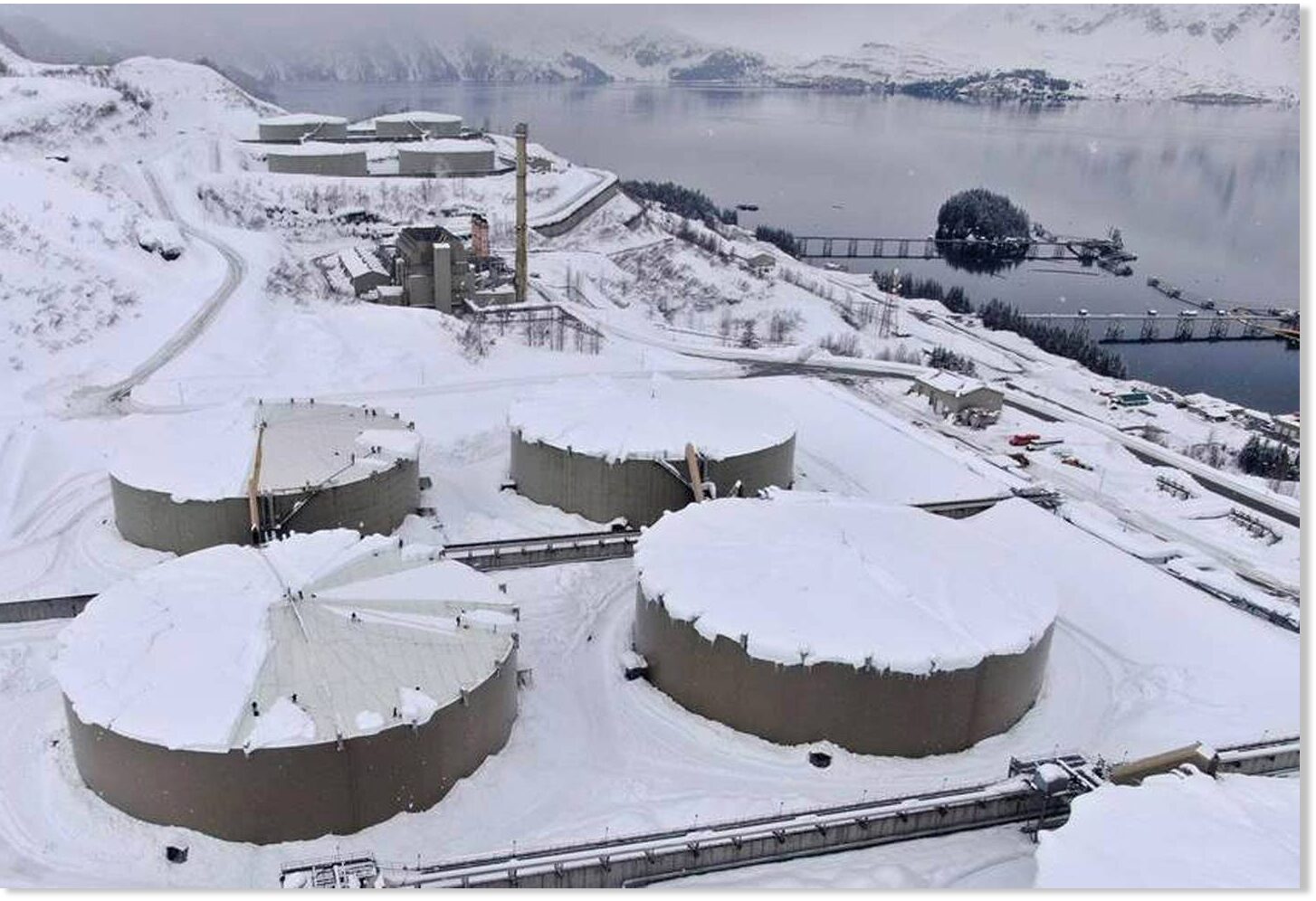 Snow pileup damages Alaska pipeline company's massive Valdez oil tanks