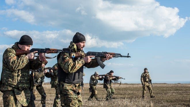 Click to enlarge The Azov Brigade trains