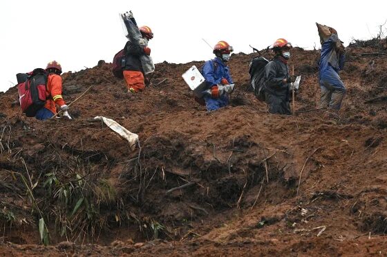 Click to enlarge Rescue workers searching for voice recorder box