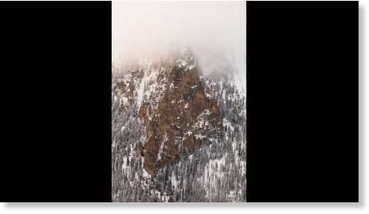 Bunsen Peak through low clouds after a spring snowstorm.
