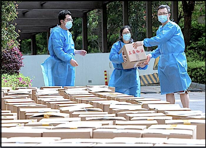 Click to enlarge Boxes and workers