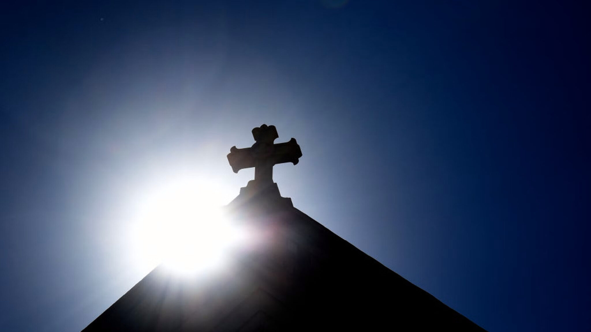 church crucifix sun