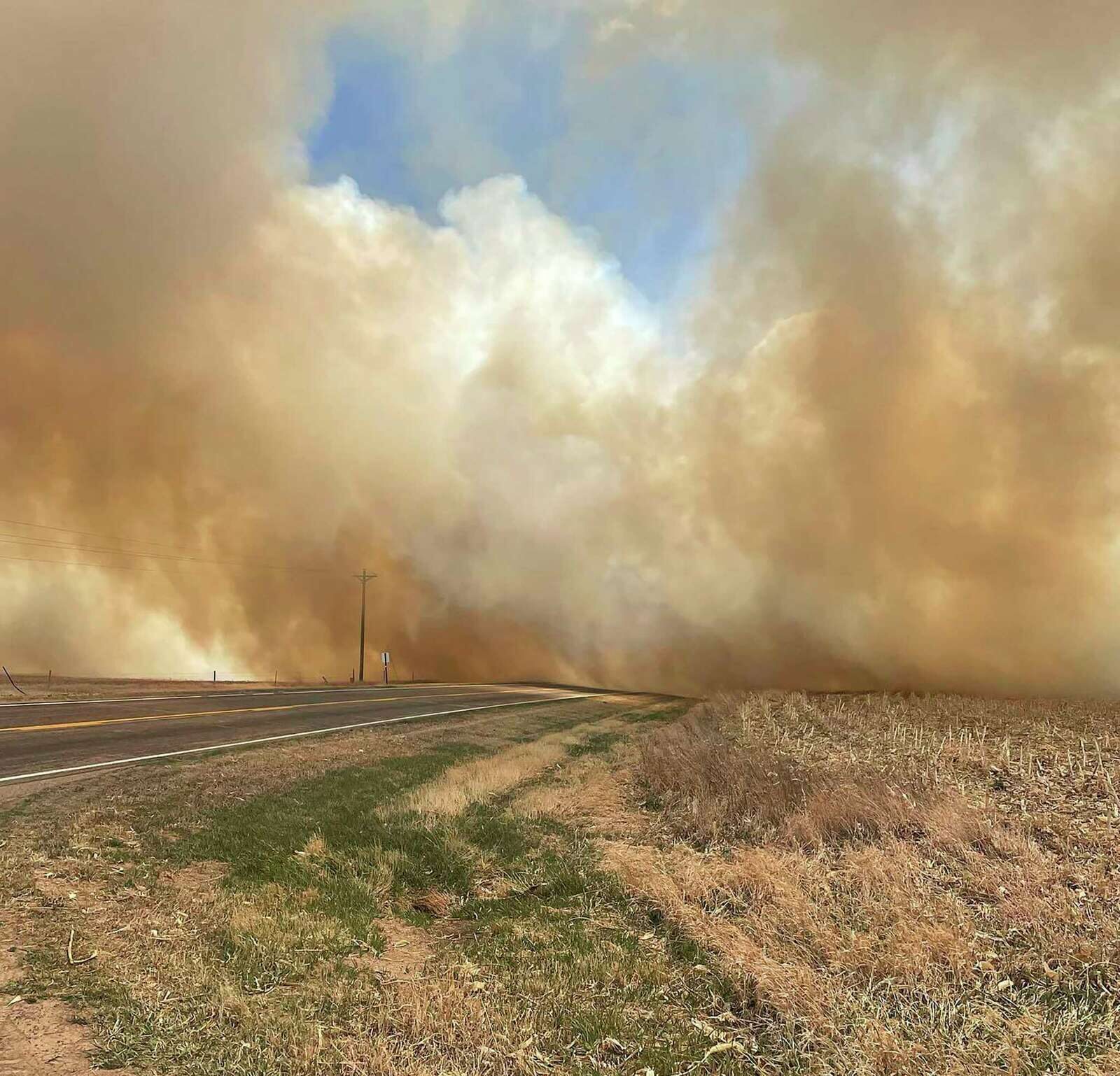 This image provided by the Nebraska State Patrol shows smoke from a wildfire, Saturday, April 23, 2022 near Cambridge, Neb.