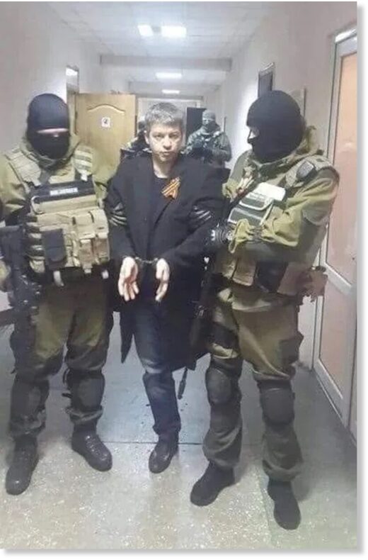 Oleg Novikov under arrest.