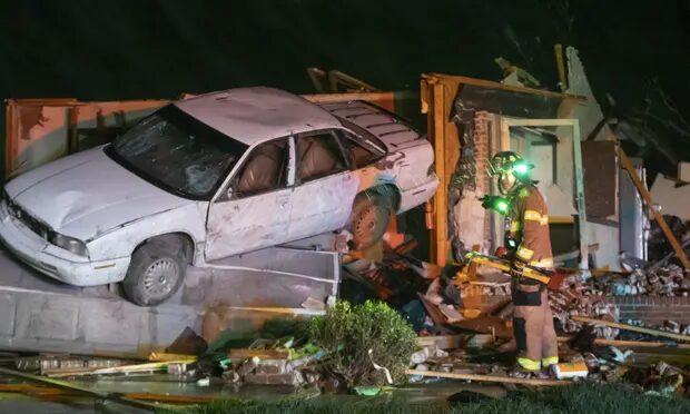 A badly damaged home in Andover, Kansas after the tornado ripped through the area.