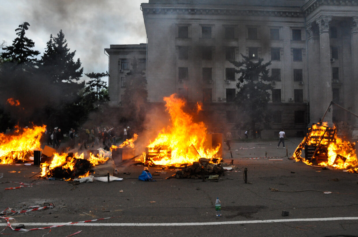 Click to enlarge 38 people died in a fire and 30 others were poisoned by carbon monoxide, in a building, during a clash in Odessa
