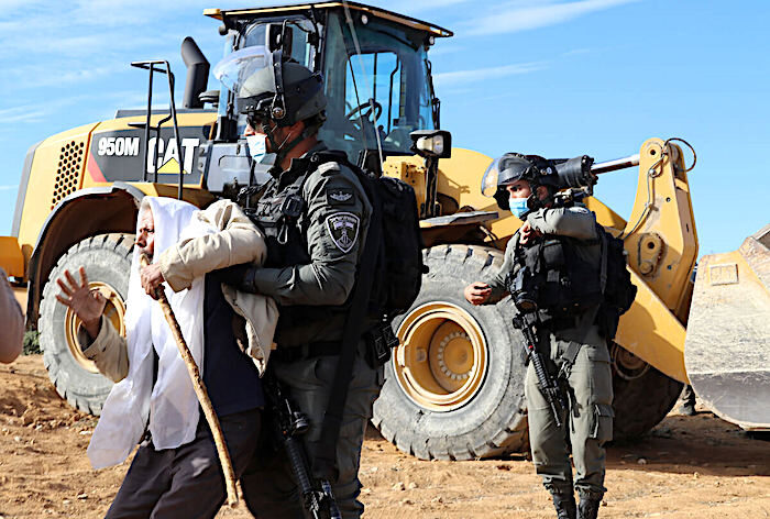 Carrying off woman protesting