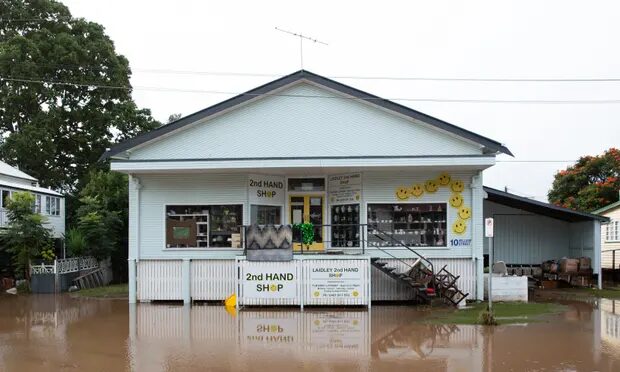 Click to enlarge Shops, streets and homes in Laidley have been flooded.