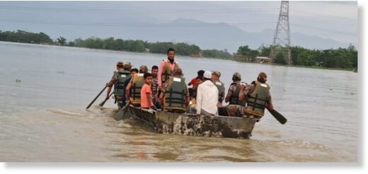 Troops from the Assam Rifles rescue flood victims