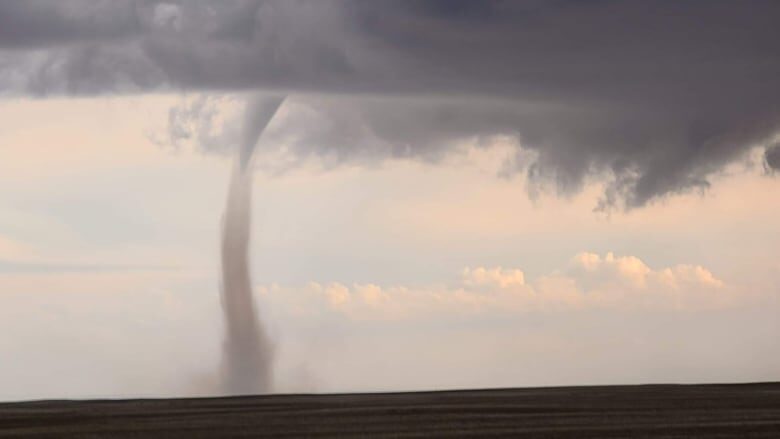 Click to enlarge An apparent landspout tornado on the ground south of Keller, Sask. reported on May 17, 2022.