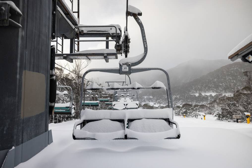 Snow blanketing the Thredbo chairlifts after the early season storms.