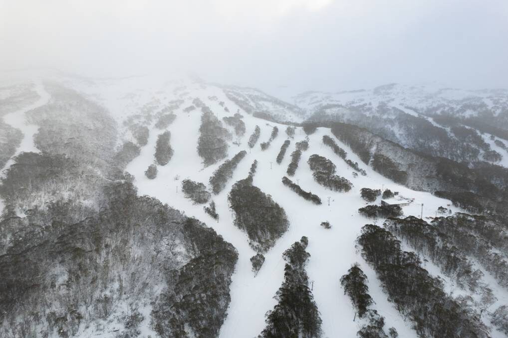 A drone shot of the empty, beckoning snow-covered Thredbo runs ahead of the opening weekend ahead.