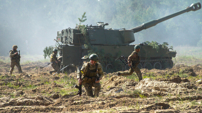 Click to enlarge Ukrainian troops in Donbass