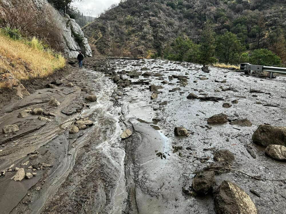 A nearly 50 mile stretch of California's Highway 70 that winds through the Feather River Canyon is closed due to mudslides triggered by thunderstorms in the Dixie Fire burn scar, officials said Sunday.