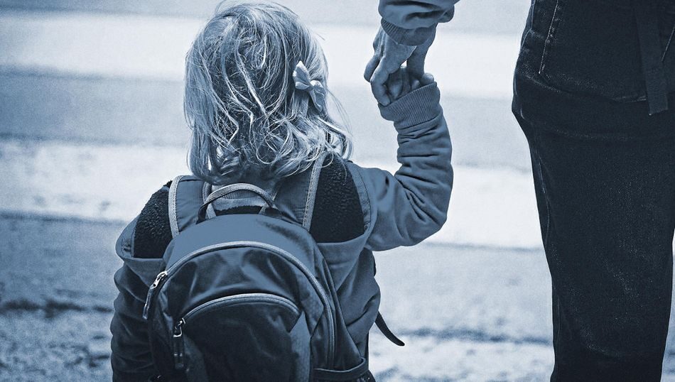Click to enlarge child with parent backpack