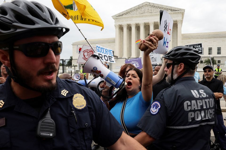 Click to enlarge protest clash supreme court abortion