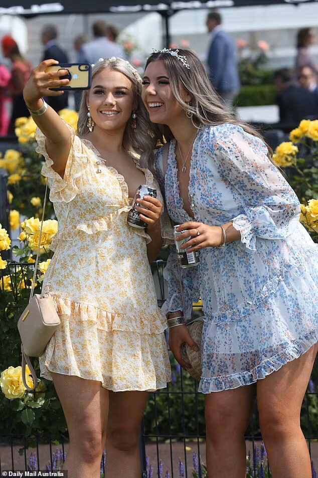 Click to enlarge Two woman enjoying a day out at Flemington Racecourse