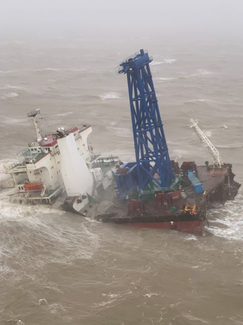 Click to enlarge A vessel is seen sinking after it snapped in two as tropical storm Chaba passed through, according to authorities, in waters off Hong Kong, China July 2, 2022.