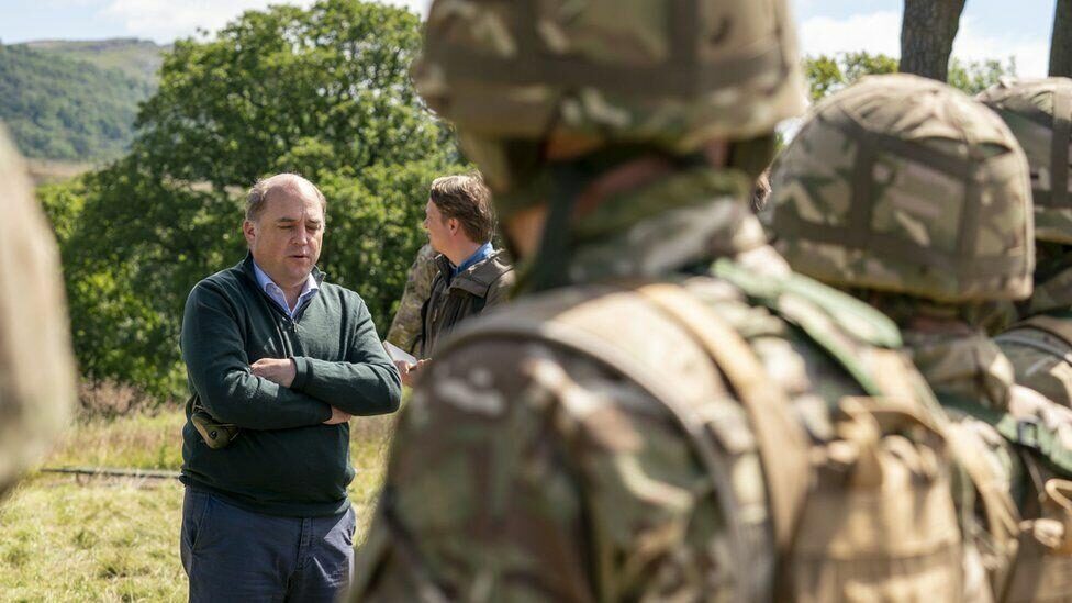 Defense chief Benn Wallace visits a training site