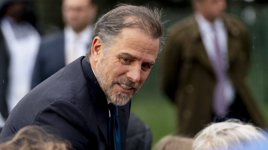 Click to enlarge Hunter Biden Eric Schwerin