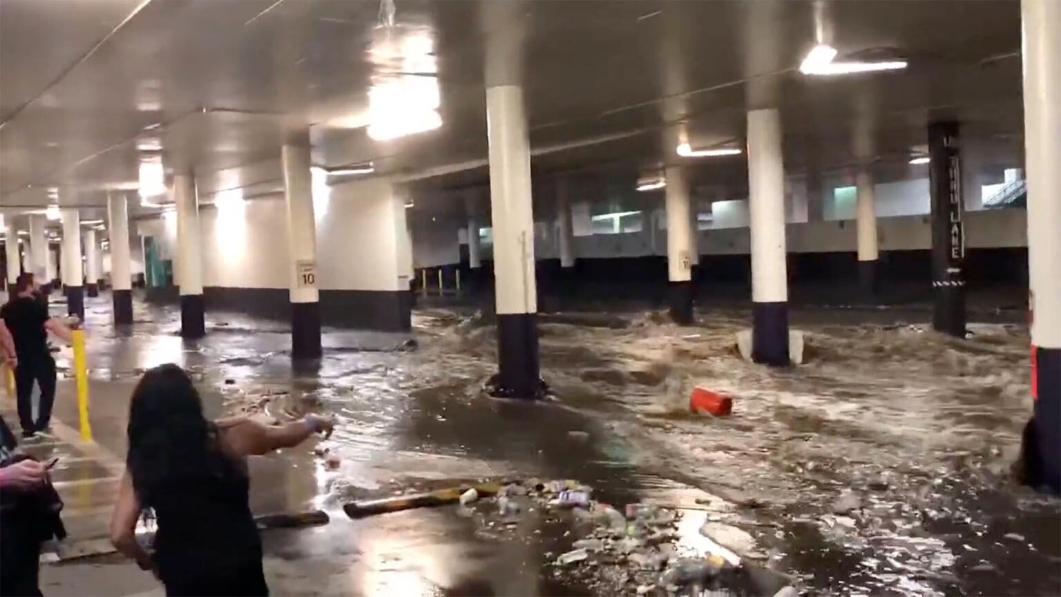 A video shared on Twitter shows intense flooding inside a parking garage on the Strip.