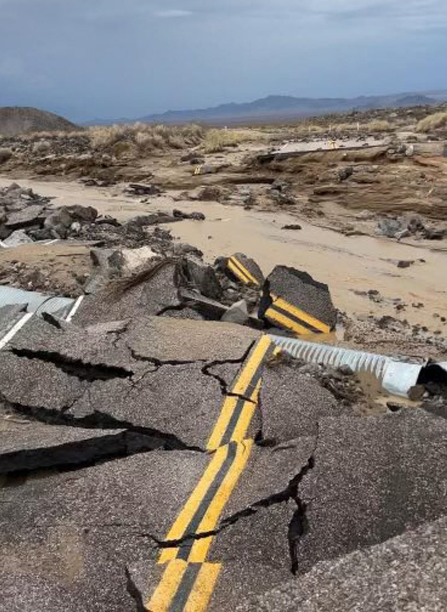 The damaged intersection of Kelbacker Road and Mojave Road in the Mojave National Preserve, Calif., on July 31, 2022.