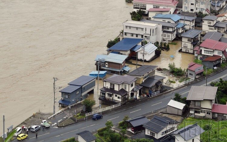 Click to enlarge Houses are flooded in the town of Oe in Yamagata Prefecture on Thursday