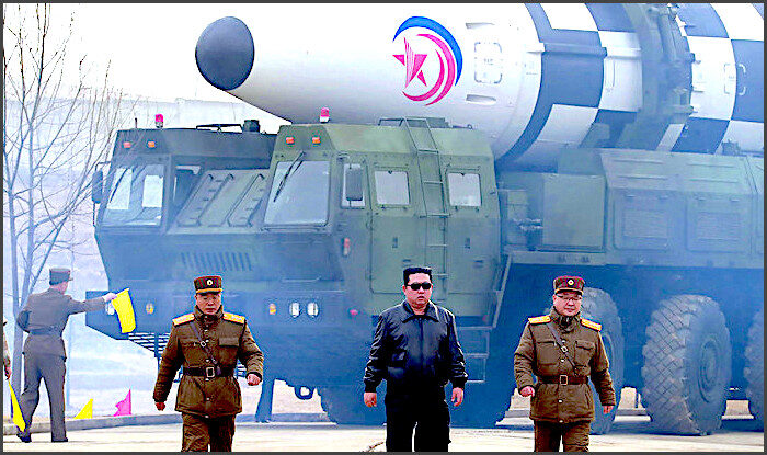 Click to enlarge Kim and missile
