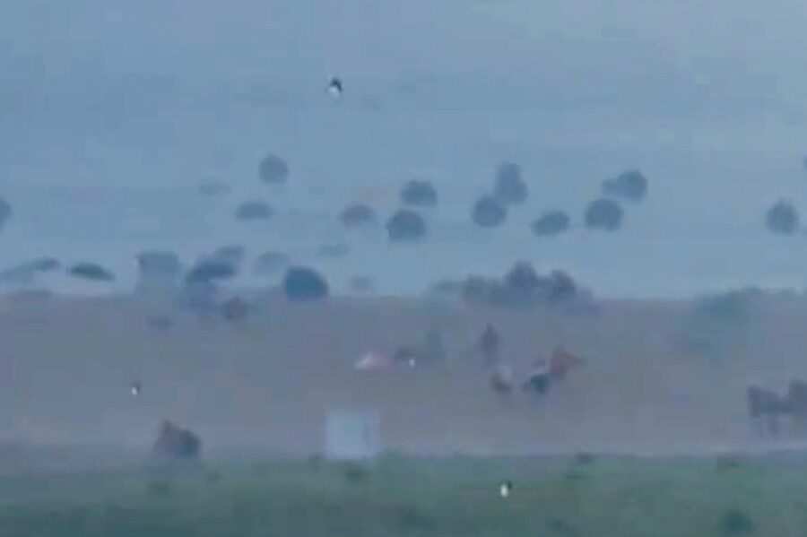 Click to enlarge flying umbrellas