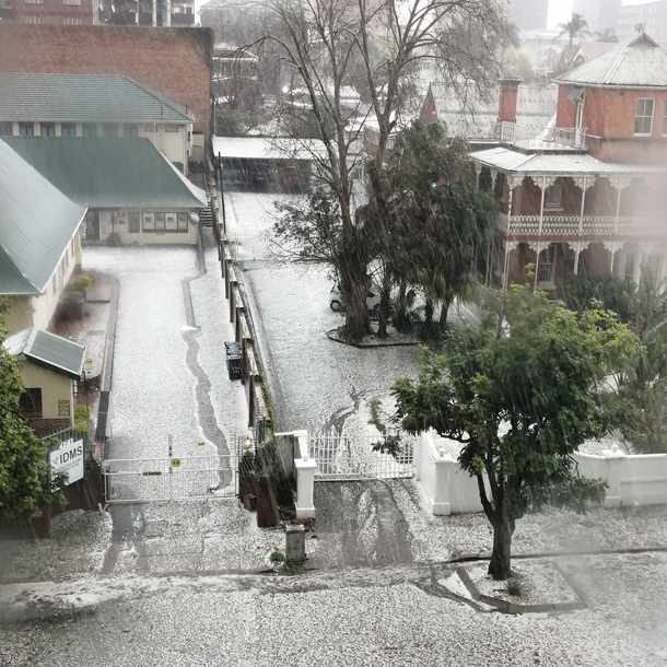 Click to enlarge Parts of Pietermaritzburg were covered in hail after a thunderstorm on Monday.