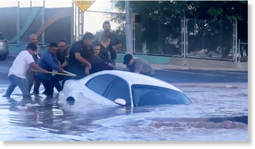 Watch dramatic rescue as car gets sucked into sinkhole