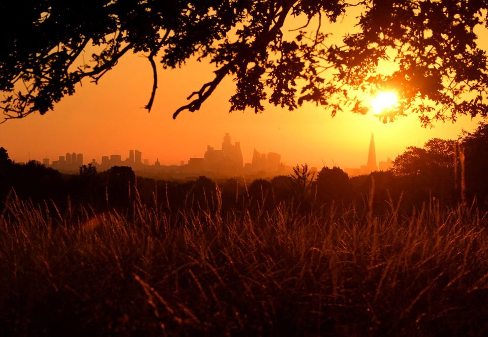 The sun rises above the London skyline, as a second heatwave is predicted for parts of the country, in London, Britain, August 11, 2022.